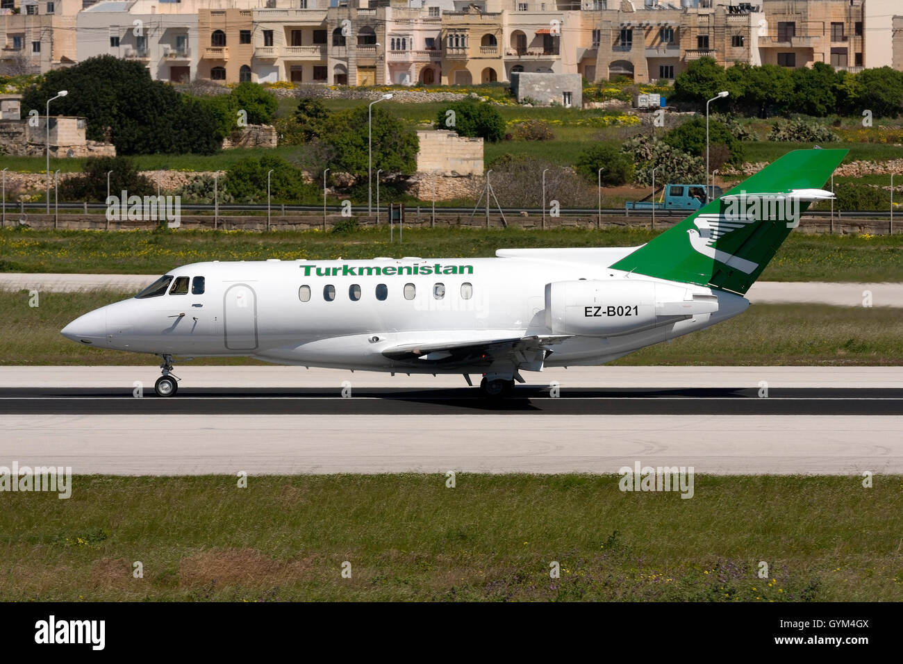 Turkmenistan British Aerospace BAe-125-1000B [EZ-B021] starting its take off run on runway 32. Stock Photo
