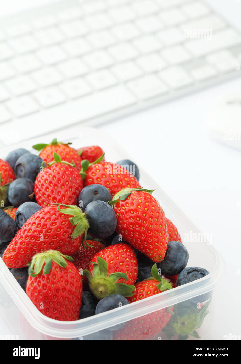 Healthy lunch box on office desk Stock Photo - Alamy