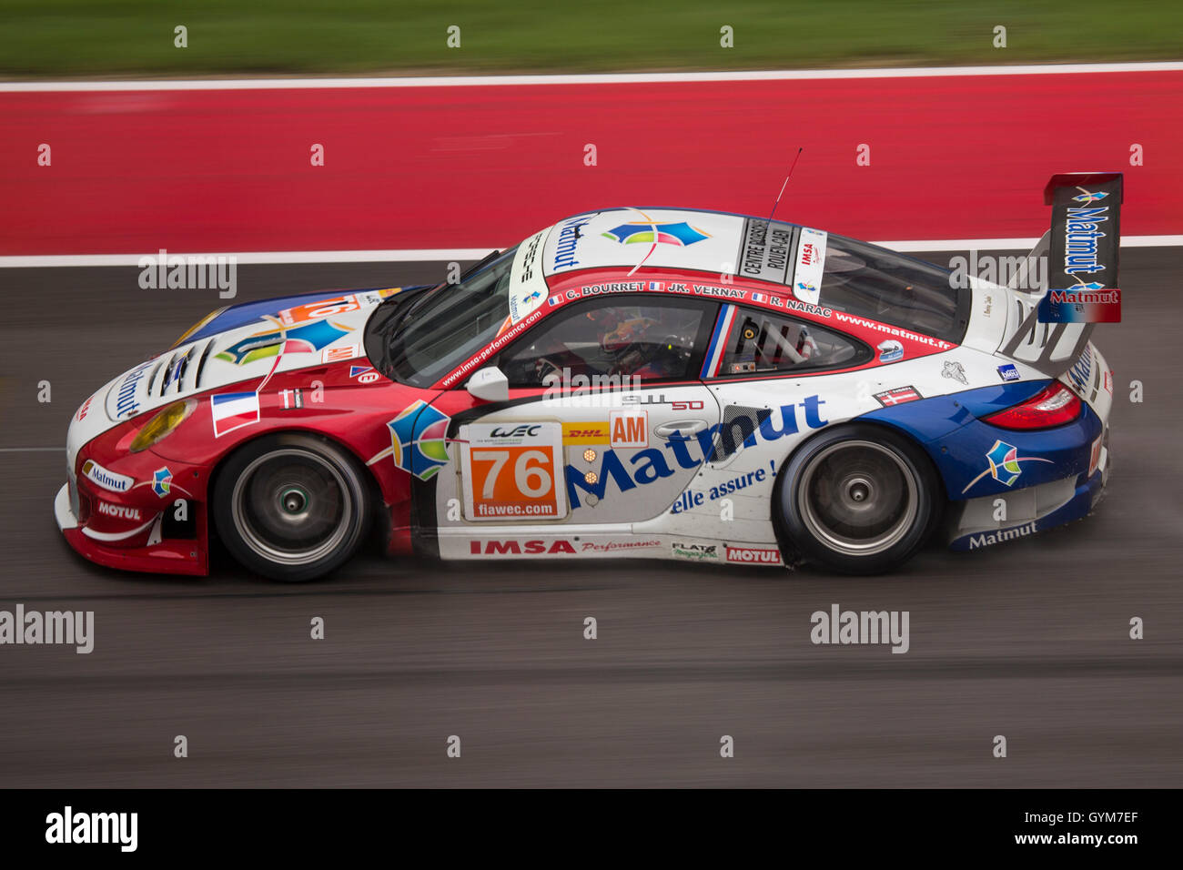 A Porsche racing car on the Circuit of the Americas Stock Photo