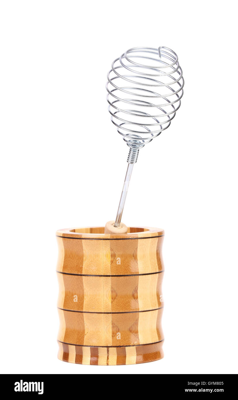 Whisk in wooden jar Stock Photo Alamy