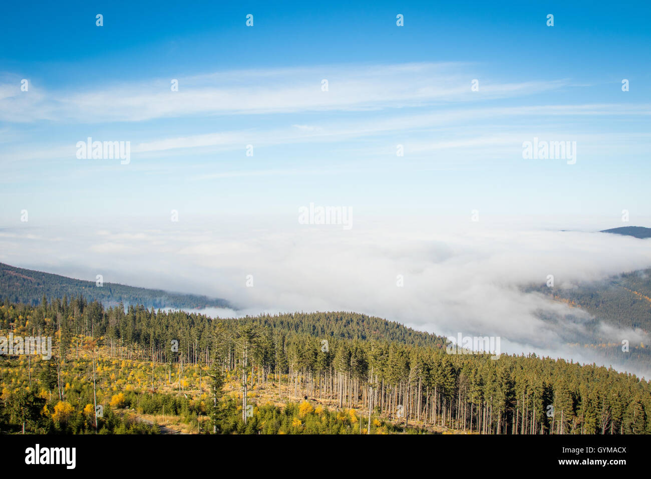Clouds over the mountains Stock Photo - Alamy