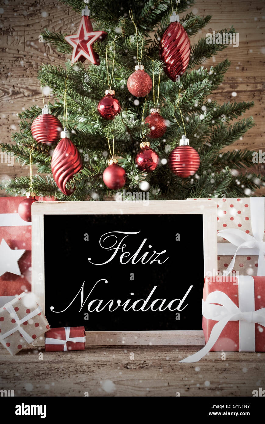 Nostalgic Tree With Feliz Navidad Means Merry Christmas Stock Photo