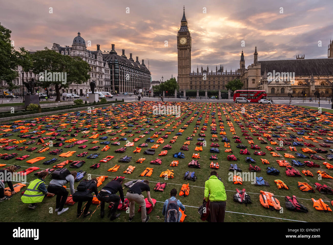 London, UK. 19th September, 2016. 'Lifejacket Graveyard' display by  refugees and charities in Parliament Square as world leaders meet at United  Nations Migration Summit in New York. The lifejackets, many made by