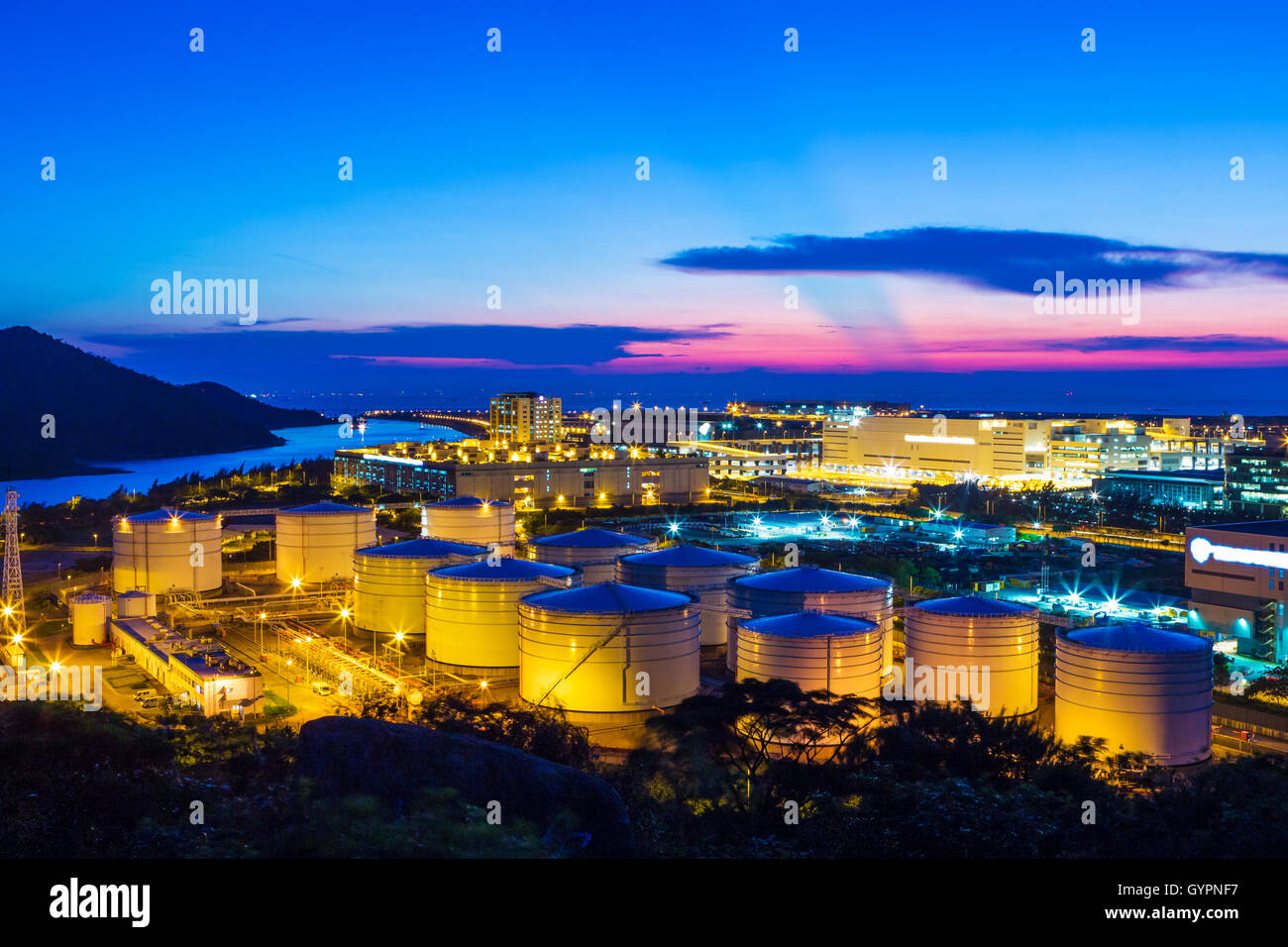 Oil tanks at night Stock Photo Alamy