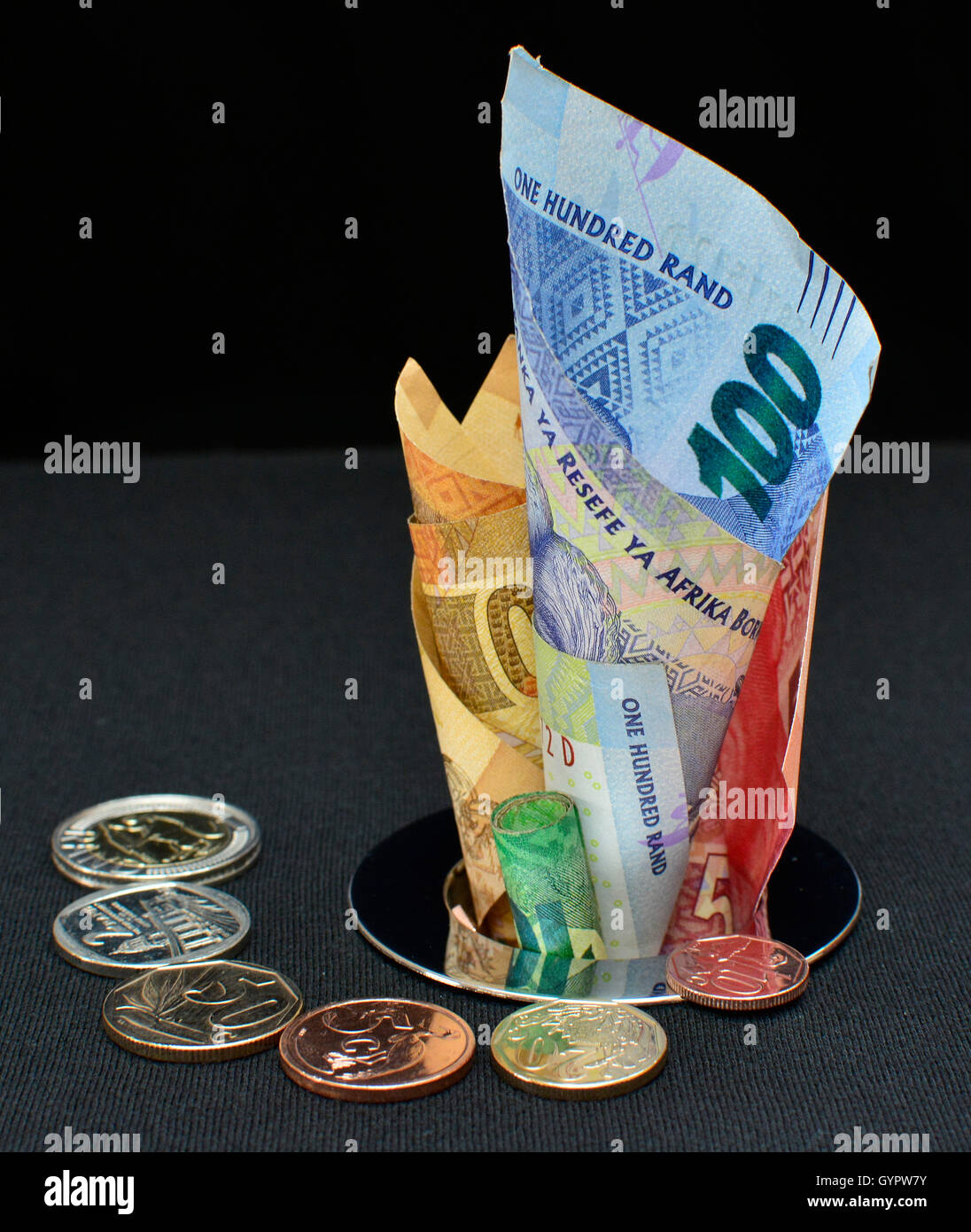 Money down the drain concept. Money lost. Money spent unwisely. Wasteful expenditure. Bad investment. Side view. Stock Photo