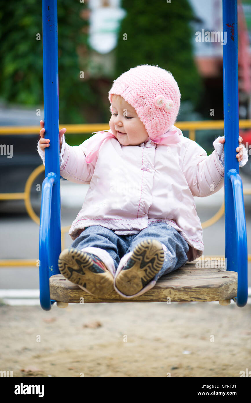 little baby in a swing Stock Photo Alamy