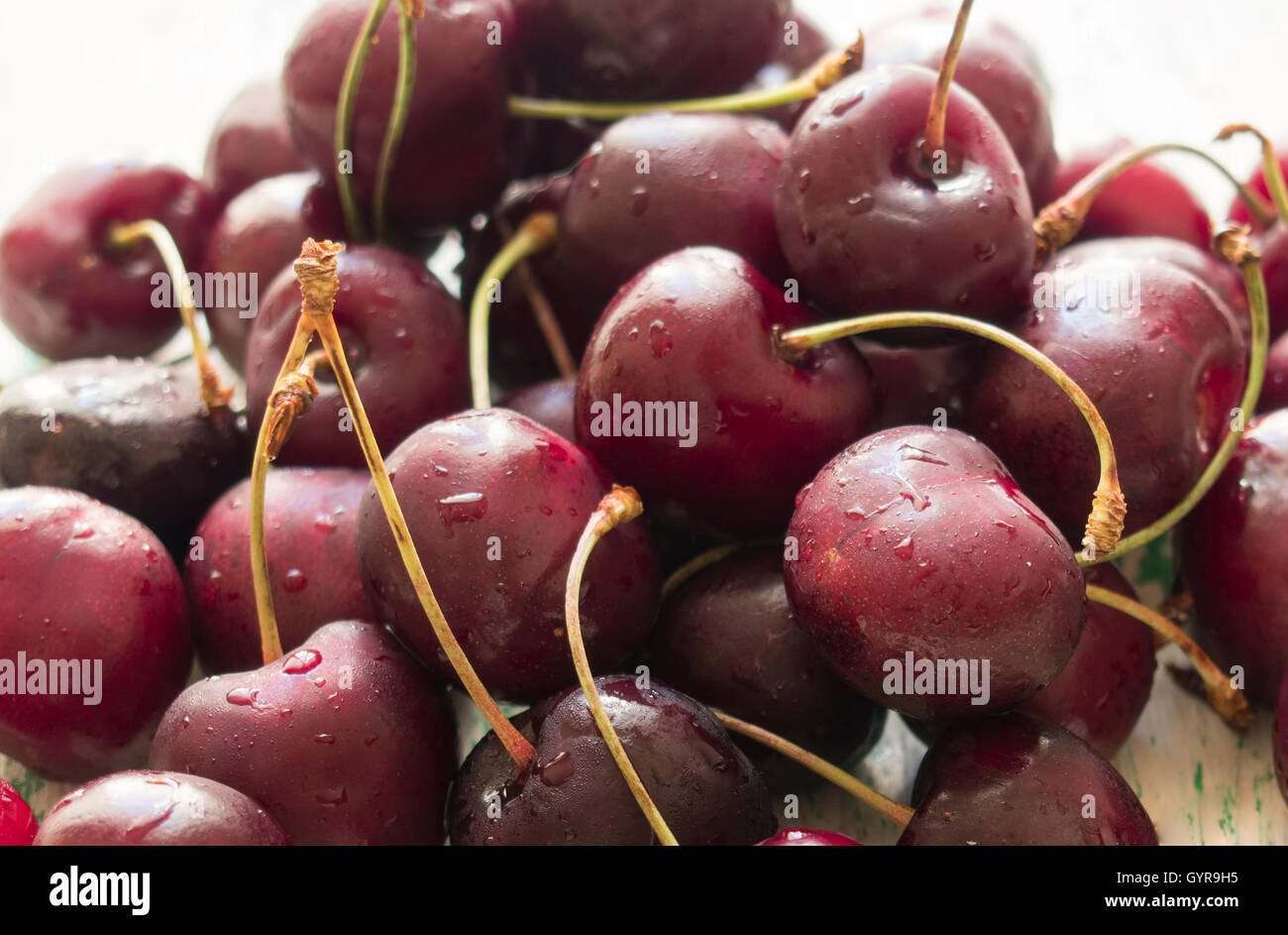 ripe cherry with small drops of dew Stock Photo - Alamy