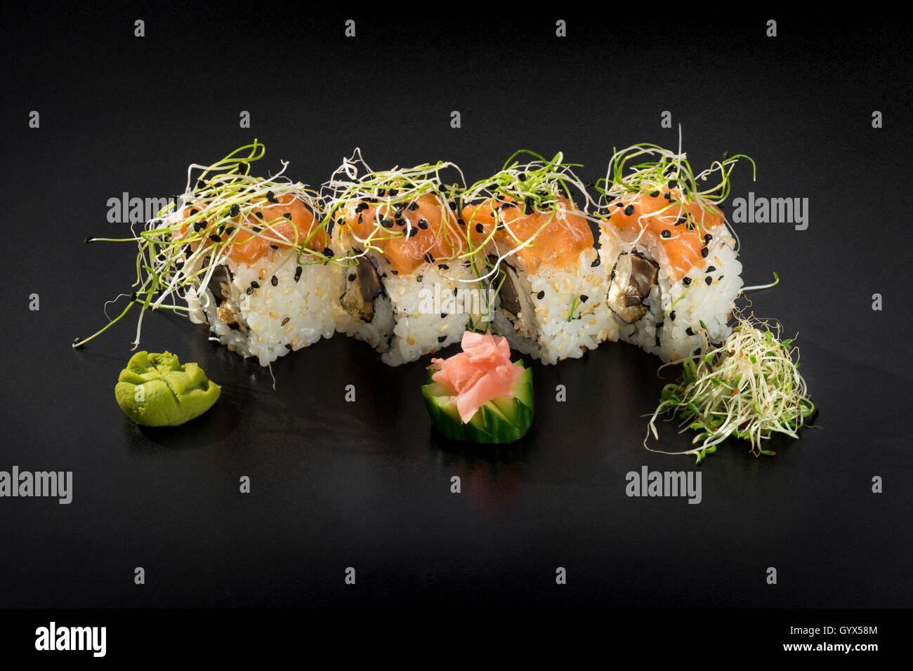 Uramaki salmon roll with avocado Stock Photo Alamy