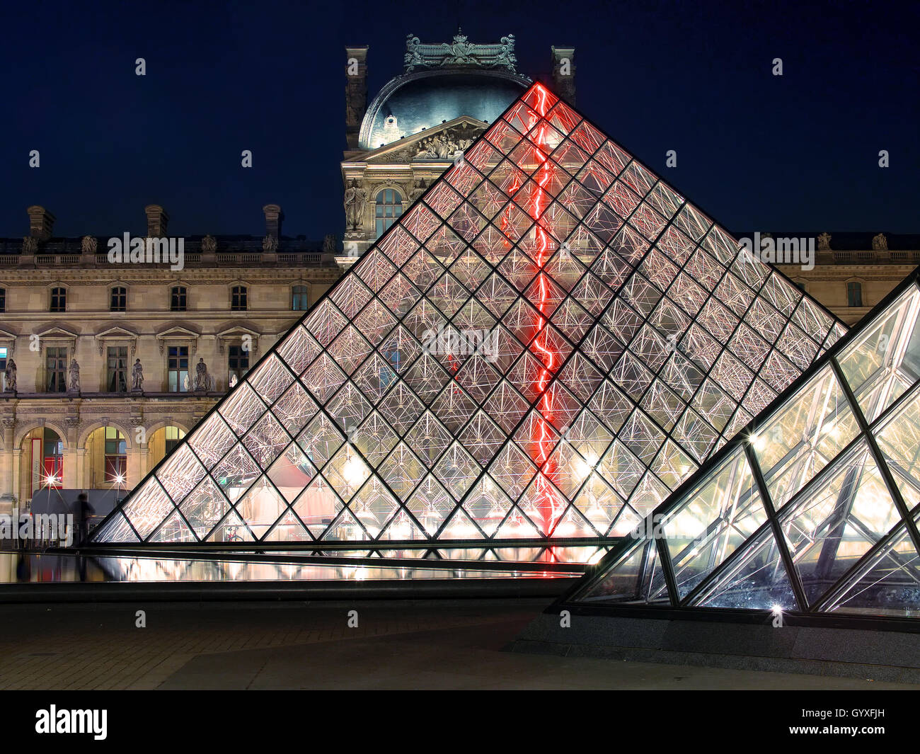 Louvre Pyramid (Pyramide du Louvre) at Louvre Museum, Paris, France, at night Stock Photo