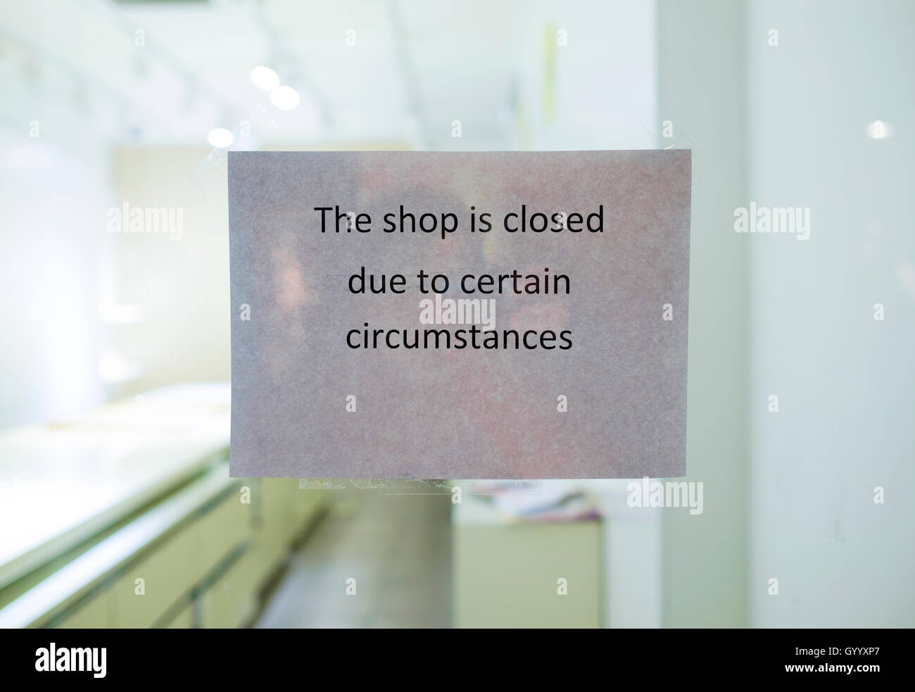 Paper note on a window, note with inscription 'The shop is closed due to certain circumstances', Amsterdam, The Netherlands Stock Photo