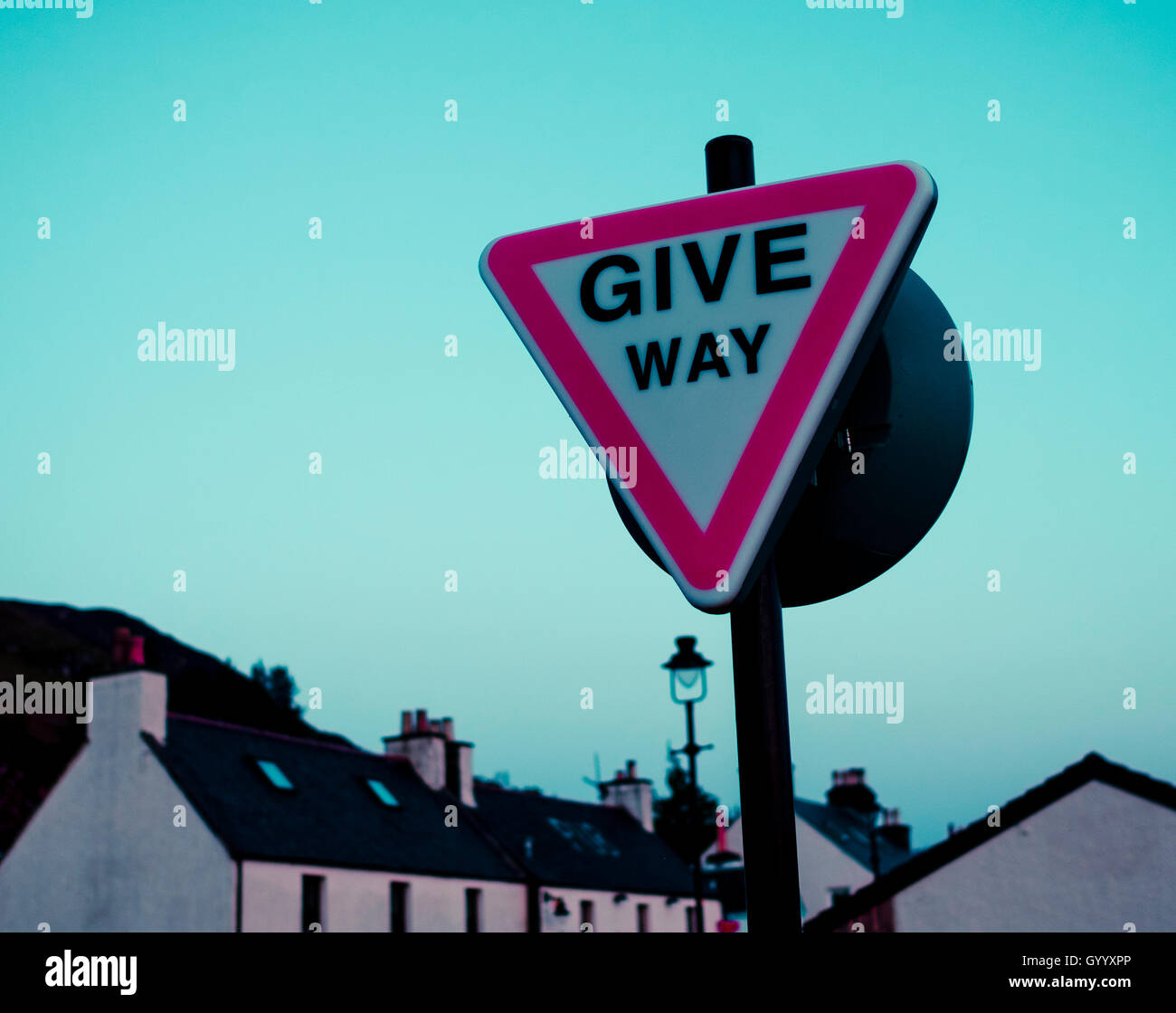 Street Sign Give way in the evening, Dornie, Highland, Scotland, United Kingdom Stock Photo