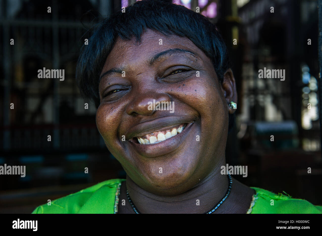 Happy gatekeeper in the St. George´s cathedral, Georgetown, Guyana Stock Photo