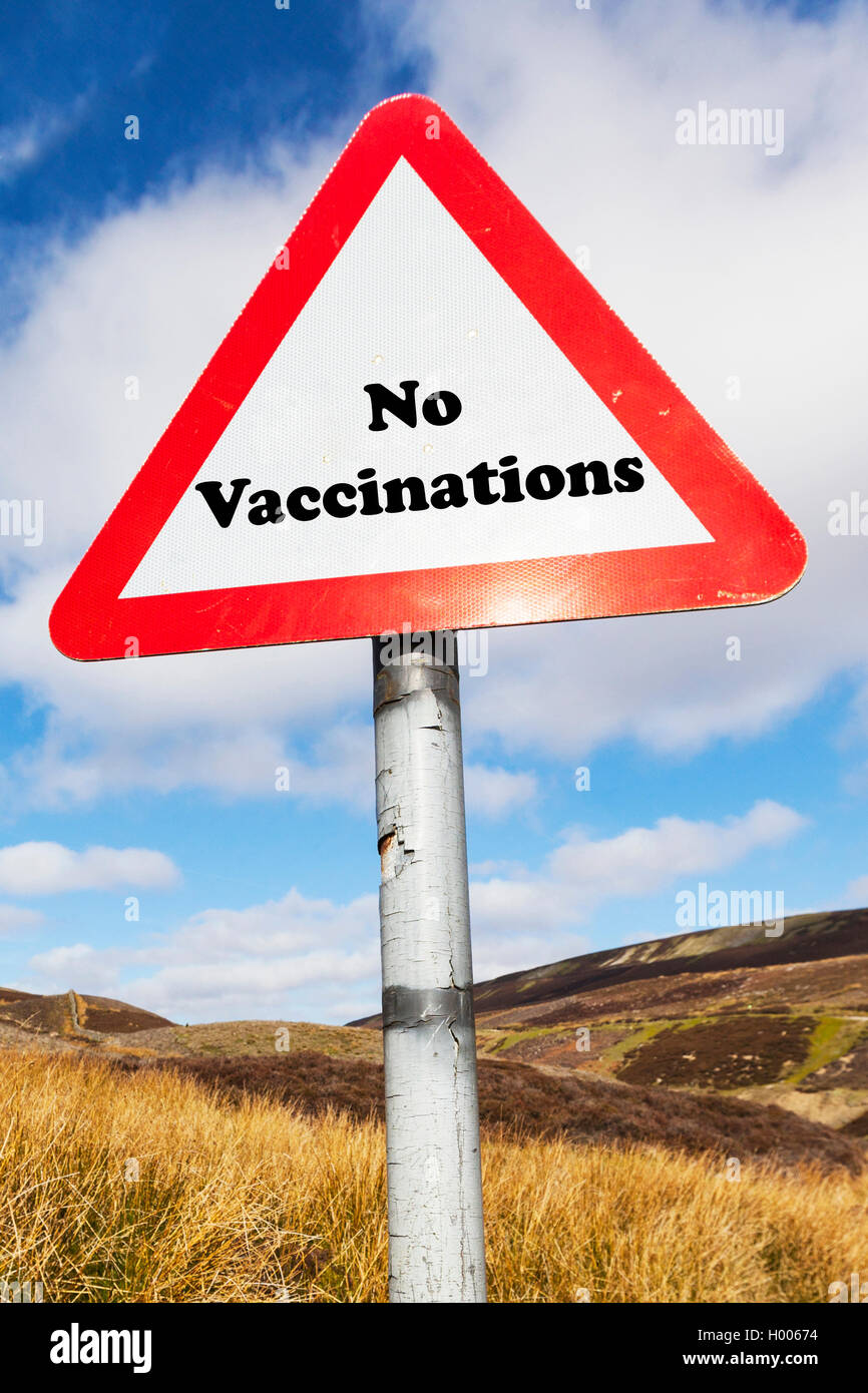 No Vaccinations concept road sign vaccinate vaccination choice choose ban banned life future problem problems warning on vaccine Stock Photo