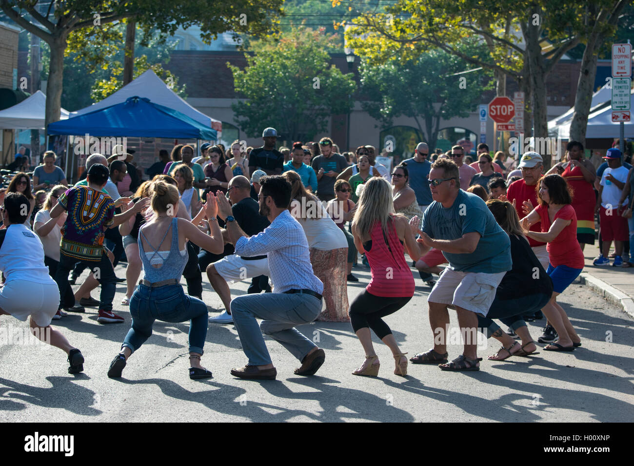 Group of people dancing at a street party Stock Photo Alamy