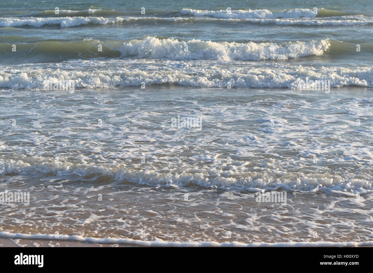 Beach waves coming. Summertime and vacation destinations Stock Photo