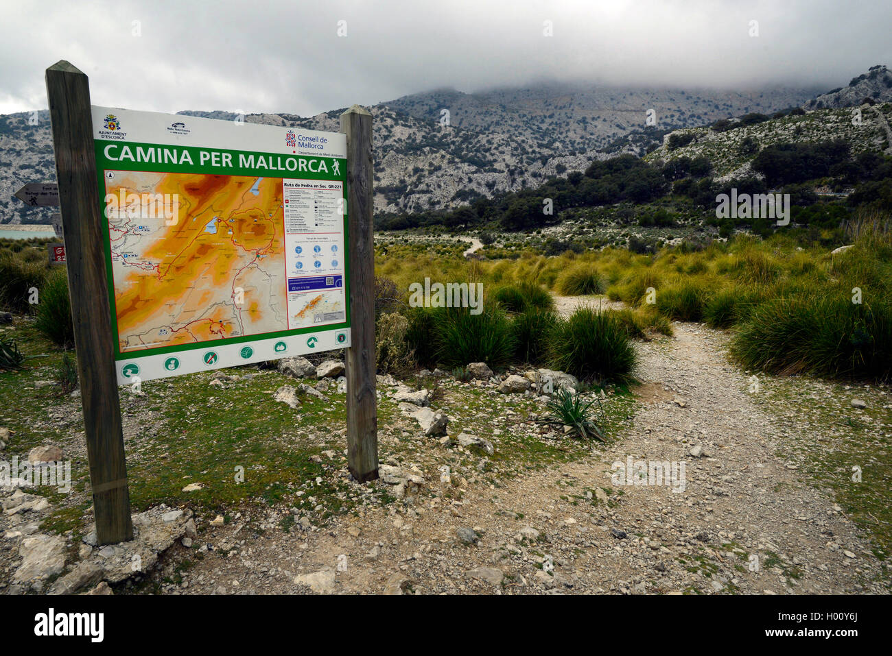 sign with map of trails at the hiking trail of Camina per Mallorca, Spain, Balearen, Majorca, Serra de Tramuntana Stock Photo