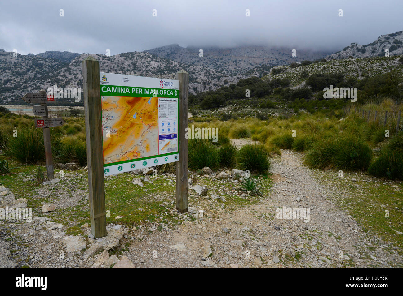 sign with map of trails at the hiking trail of Camina per Mallorca, Spain, Balearen, Majorca, Serra de Tramuntana Stock Photo