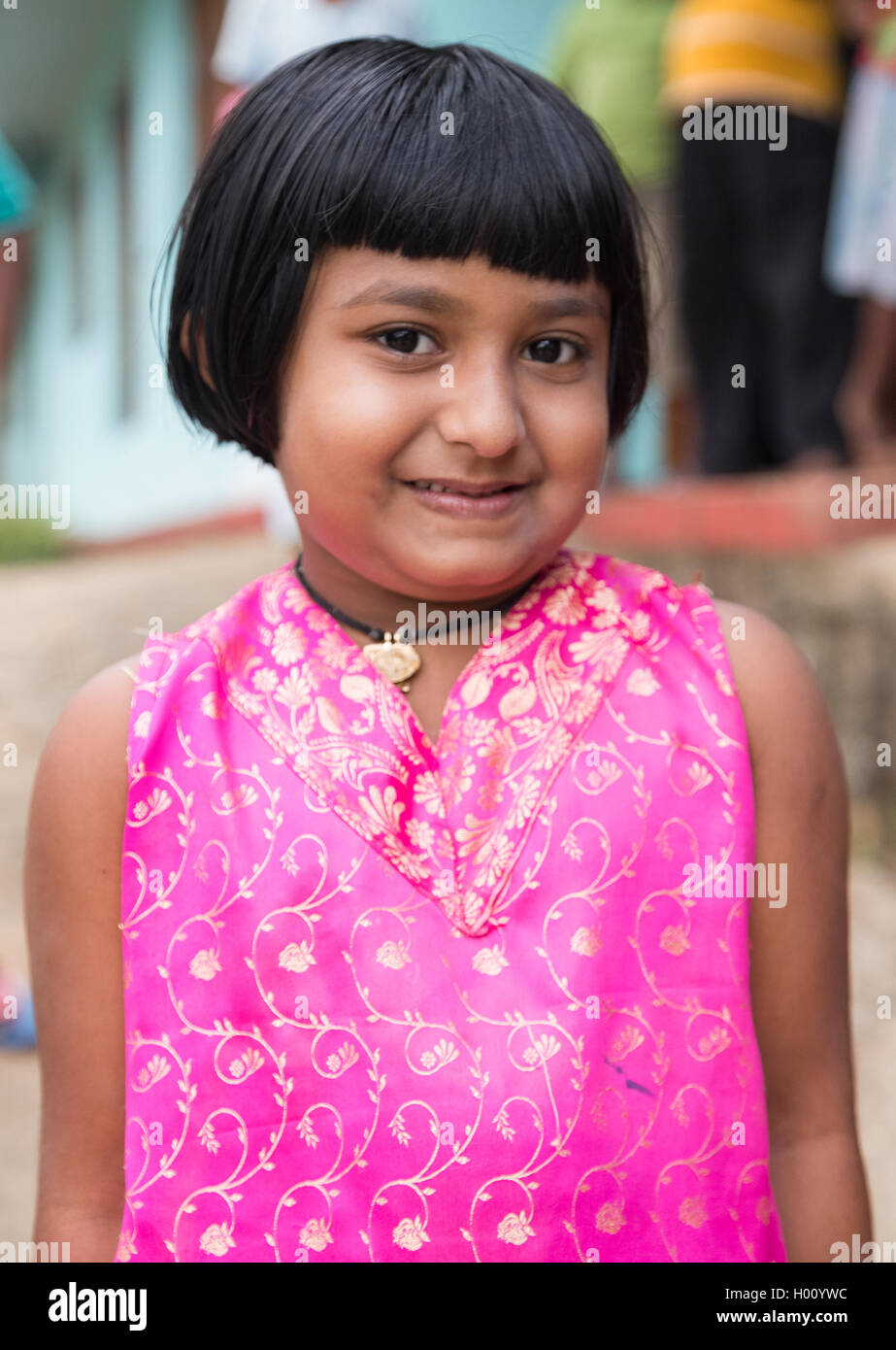 ELLA, SRI LANKA - MARCH 2, 2014: Portrait of little local girl in traditional top. Ella is famous for the tea plantations and st Stock Photo