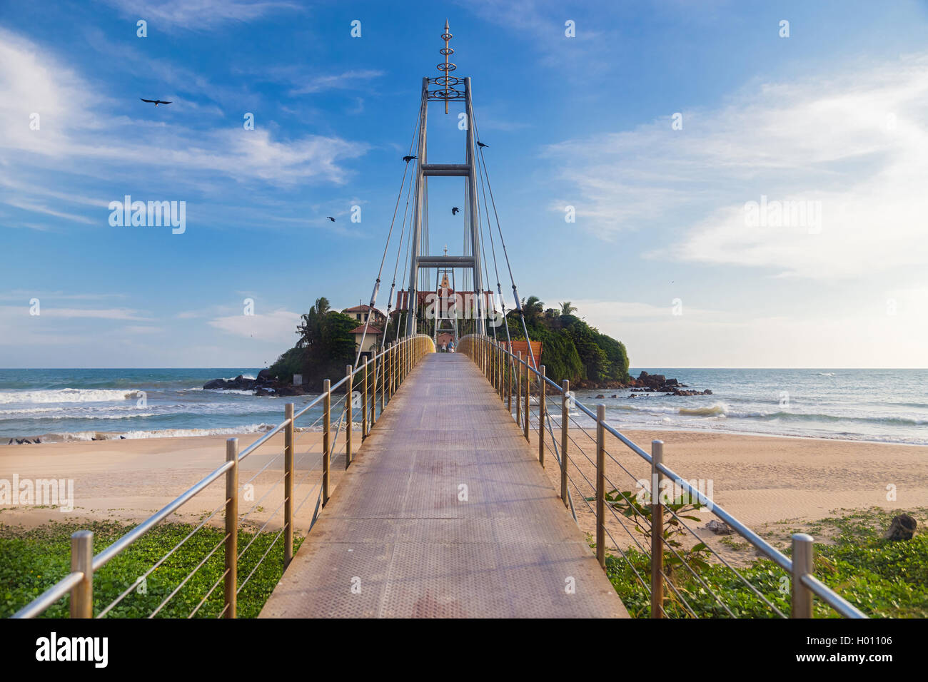 Suspension bridge connecting Pigeon Island, also called Parevi Doowa in ...