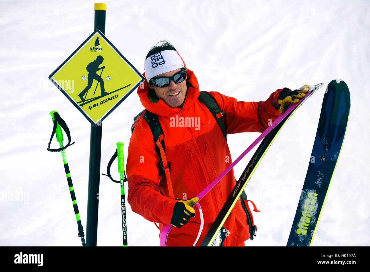 prepairing touring skies for the ascent, France, Savoie, La Plagne Stock Photo