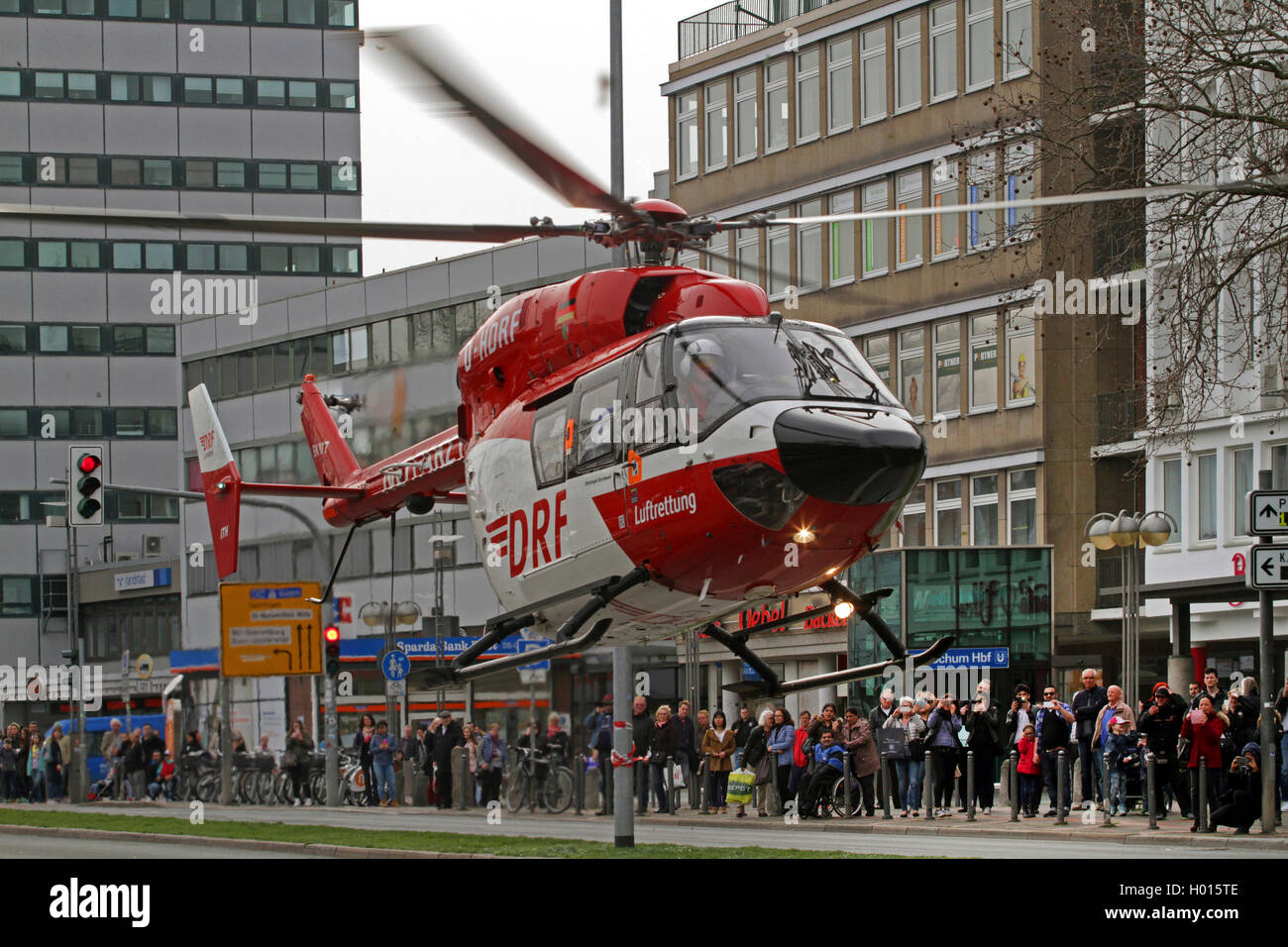 rescue helicopter approach for a landing in the inner city, Germany, North Rhine-Westphalia, Ruhr Area, Bochum Stock Photo