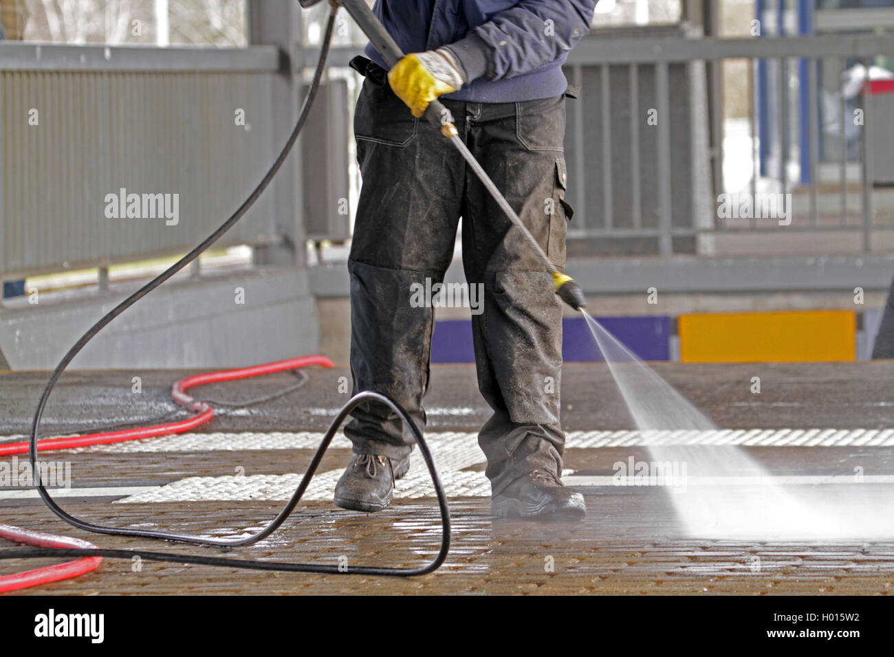 cleaning ways with pressure washer, Germany Stock Photo