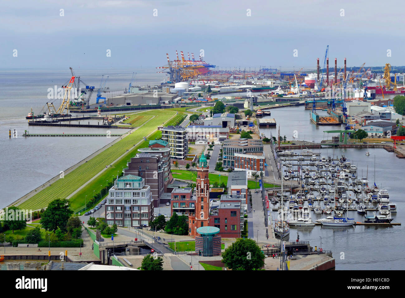 new harbor of Bremerhafen with lighthouse and container terminal in the background, Germany, Bremerhaven Stock Photo