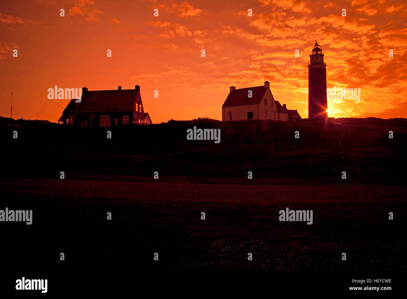 lighthouse Vuurtoren at sunset, Netherlands, Texel Stock Photo