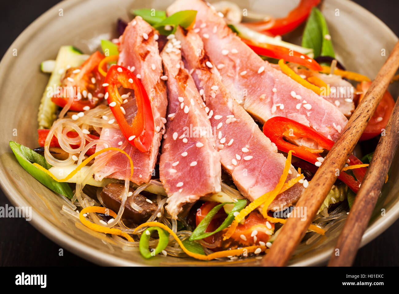 Delicious grilled tuna and asian rice glass noodles with vegetables Stock Photo Alamy