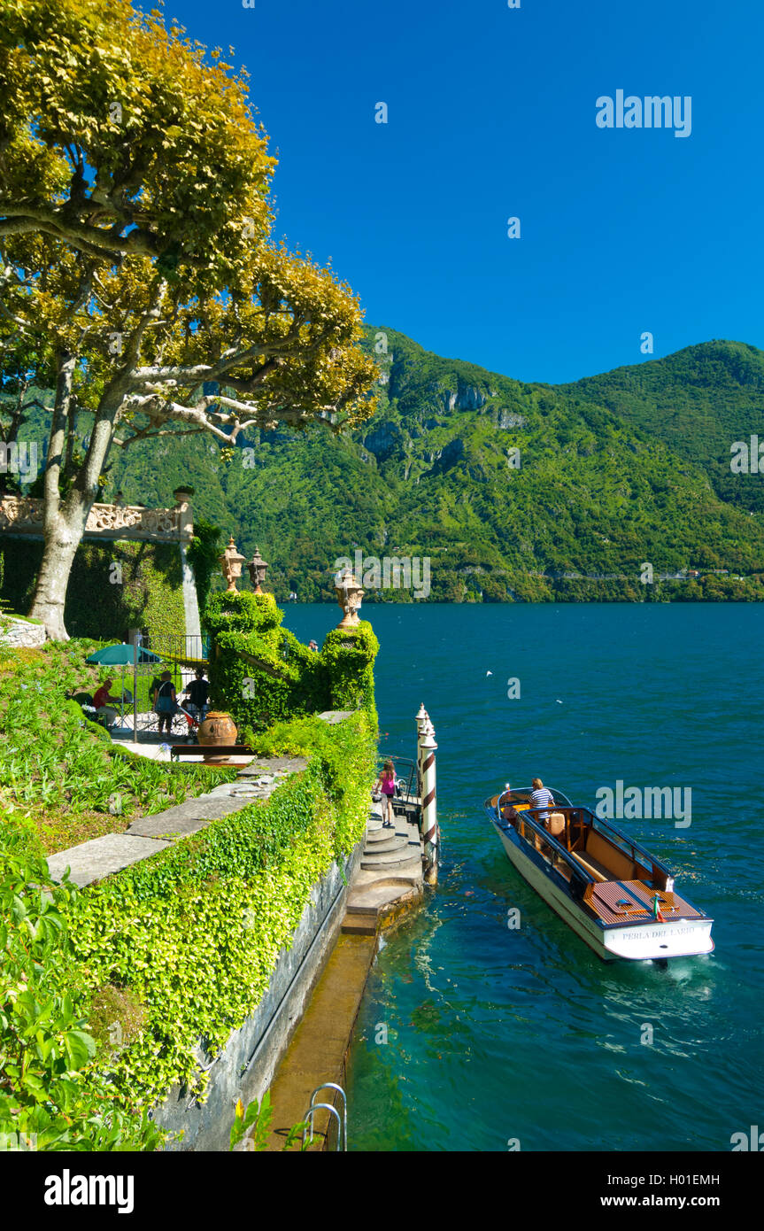 Italy, Lombardy, Como lake, Lenno, Balbianello villa, visitors arriving by boat during spring Stock Photo