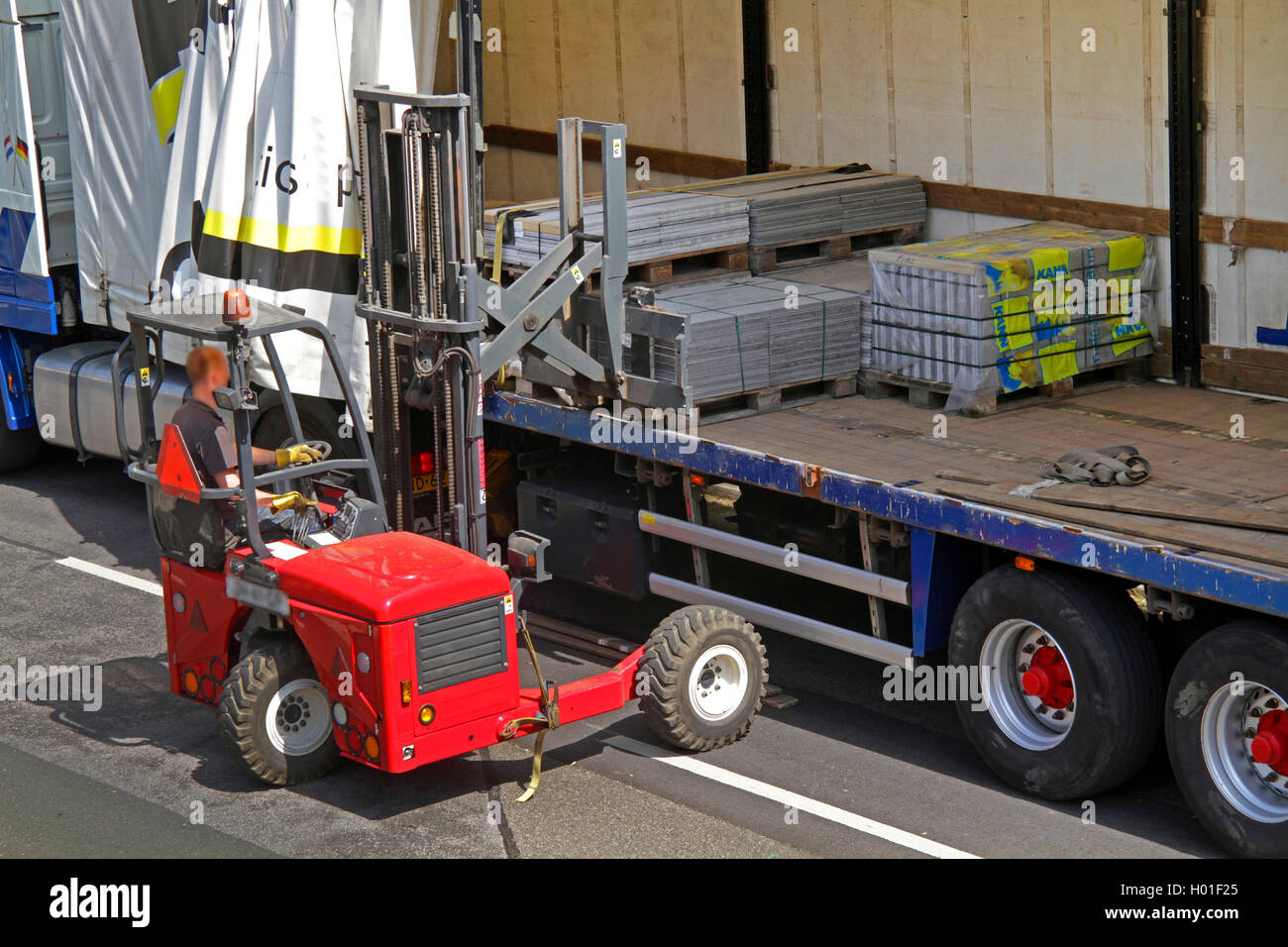 unloading a truck, Germany Stock Photo