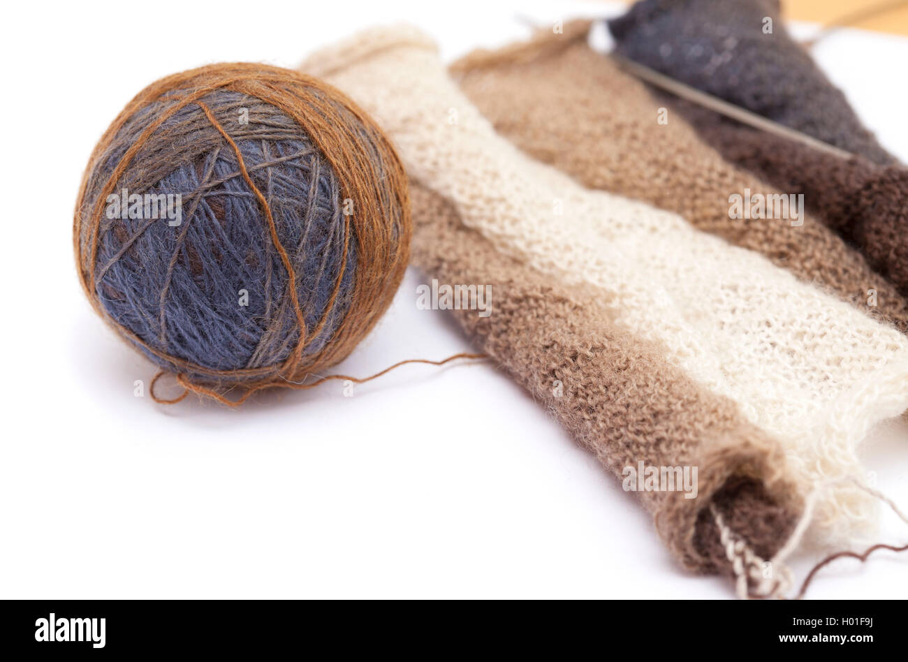 knitting 3d scarf of variegated yarn, isolated on white Stock Photo