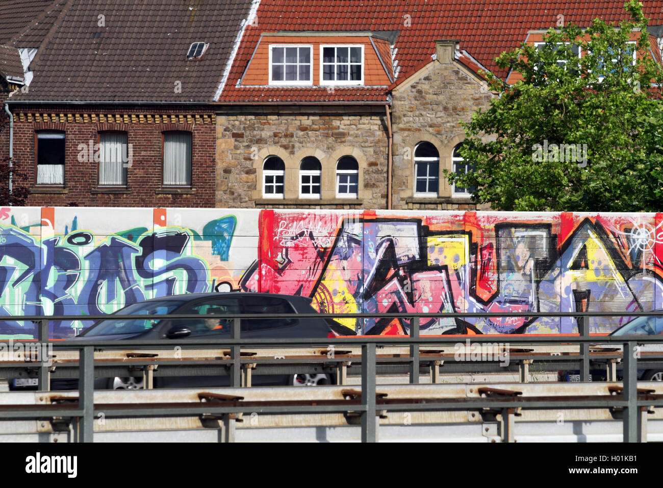 graffitis on noise protection wall, Germany, North Rhine-Westphalia, Ruhr Area, Essen Stock Photo