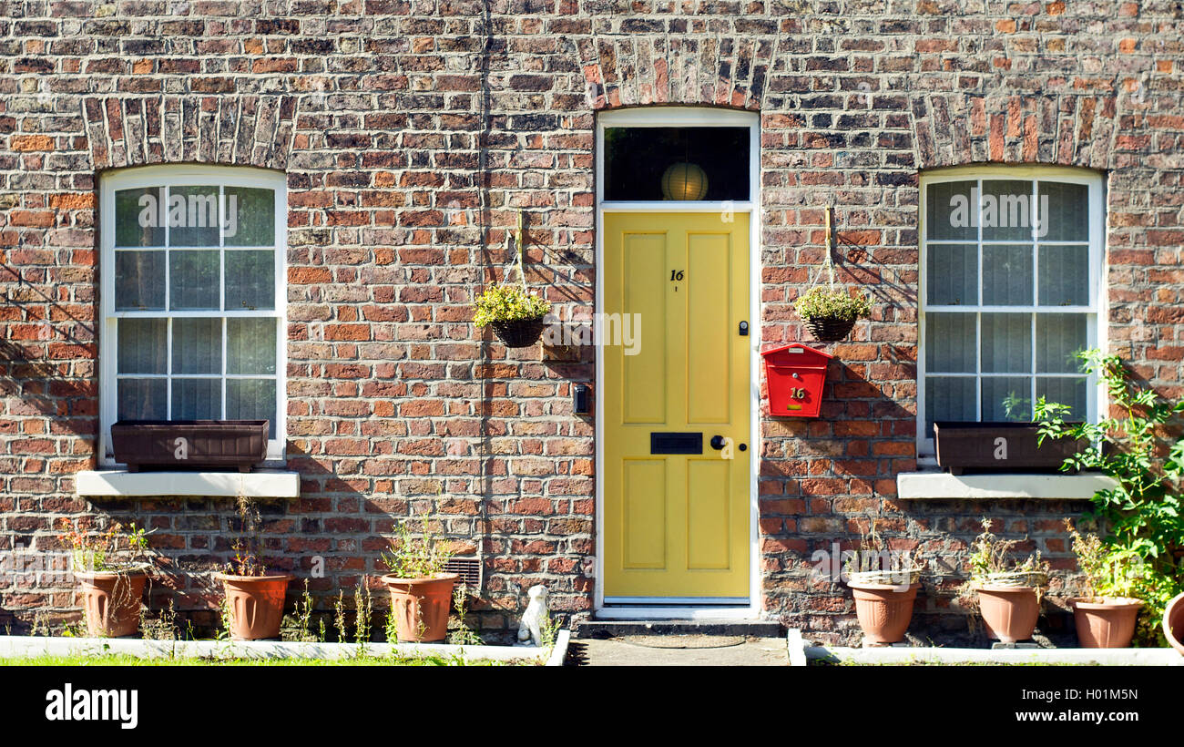 Attractive brick built cottages,Bromborough Pool Garden Stock Photo Alamy