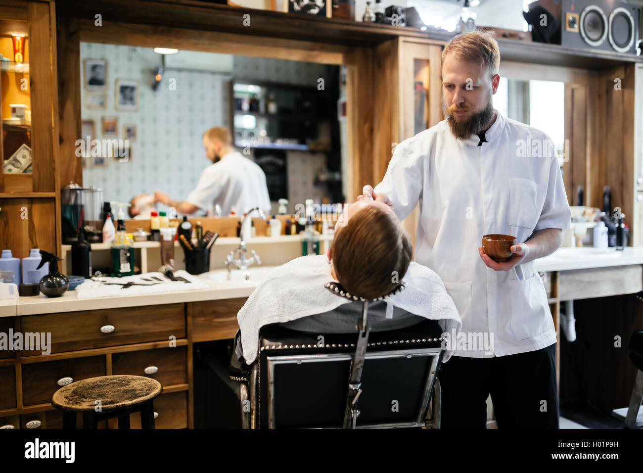 Retro shaving with foam in barber shop Stock Photo Alamy