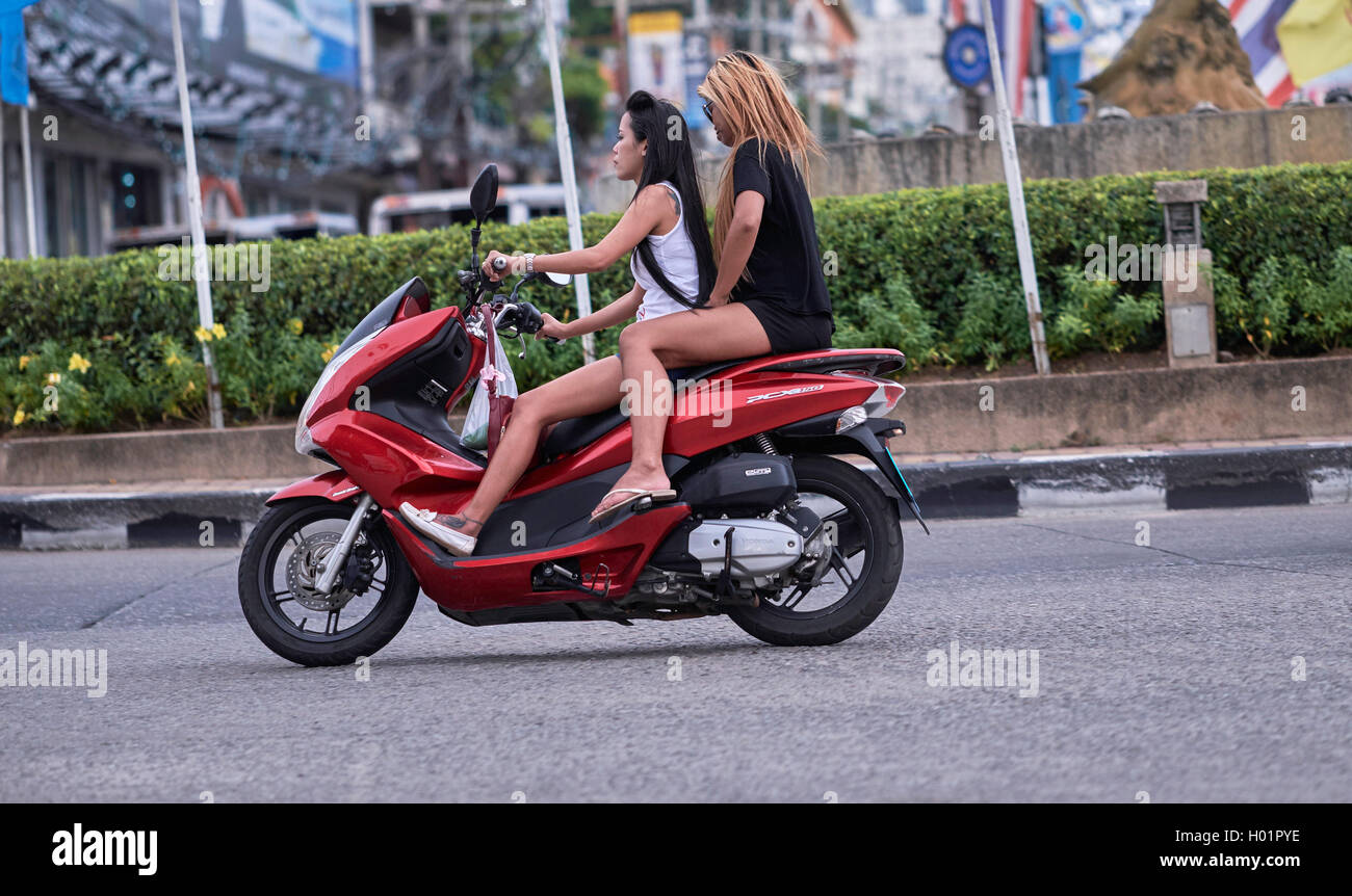 Motorcycle women. Thailand girls riding a motorcycle S. E. Asia. Woman on motorcycle Stock Photo