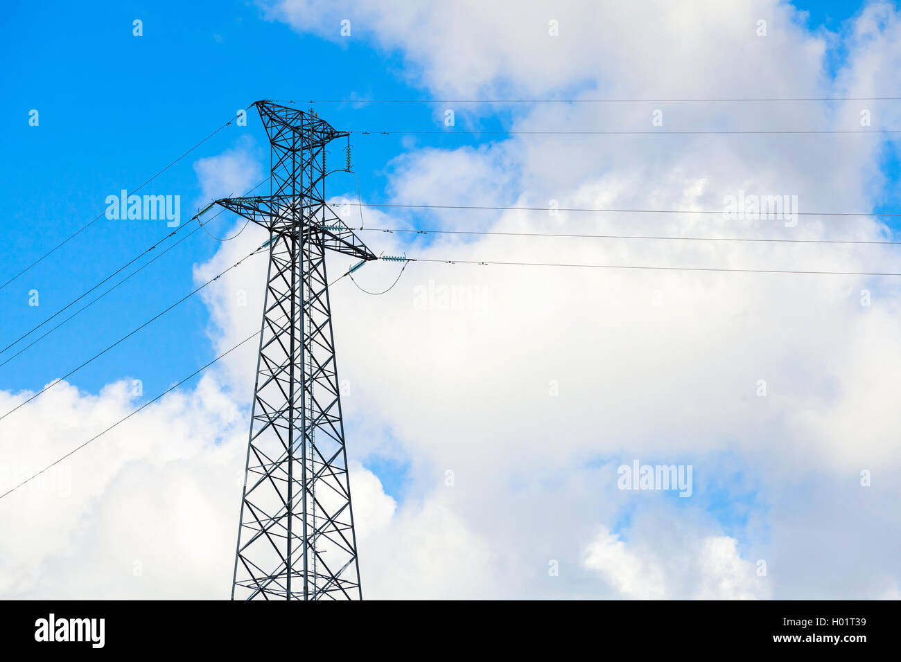 Lattice-type steel tower of high-voltage line. Overhead power line details. The structure used to transmit electrical energy in Stock Photo