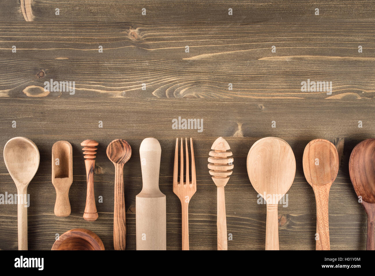 Various wooden kitchen utensils on table Stock Photo Alamy
