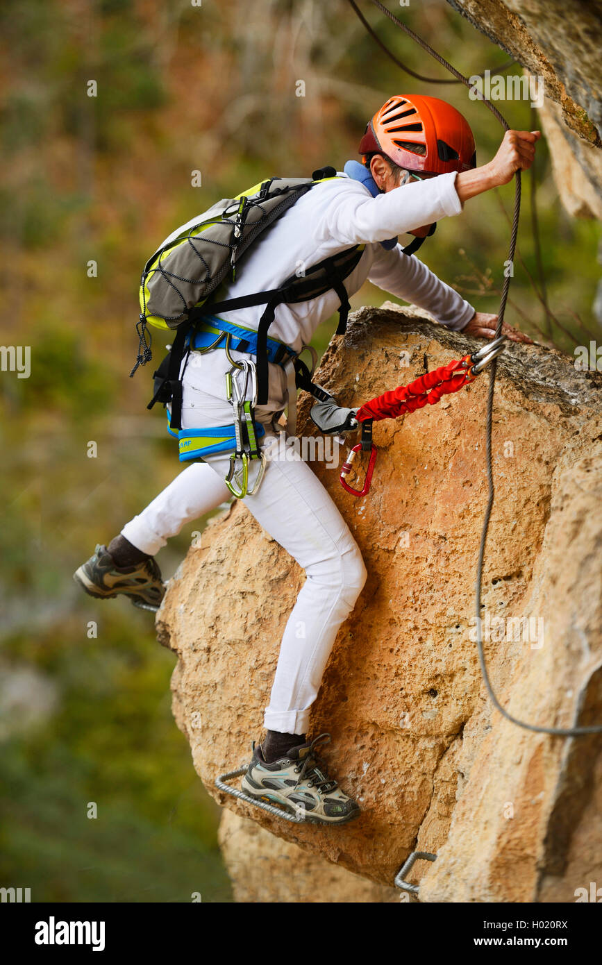 female climber at via ferrata des Gorges d┤Agnielles, France, Aspres-sur-BuÙch Stock Photo
