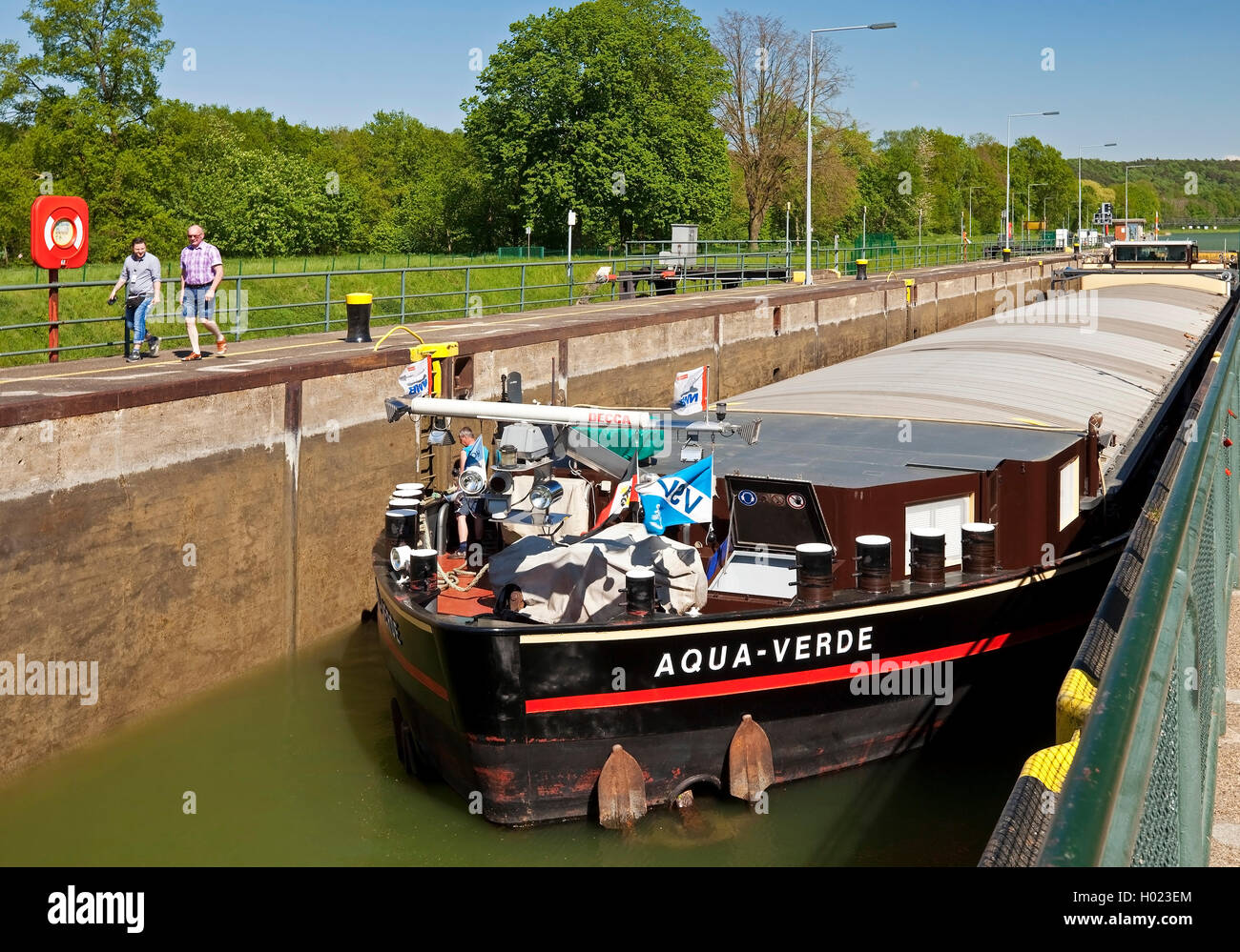 lock Bevergern with barge, Dortmund Ems Canal, Germany, North Rhine-Westphalia, Muensterland, Hoerstel Stock Photo