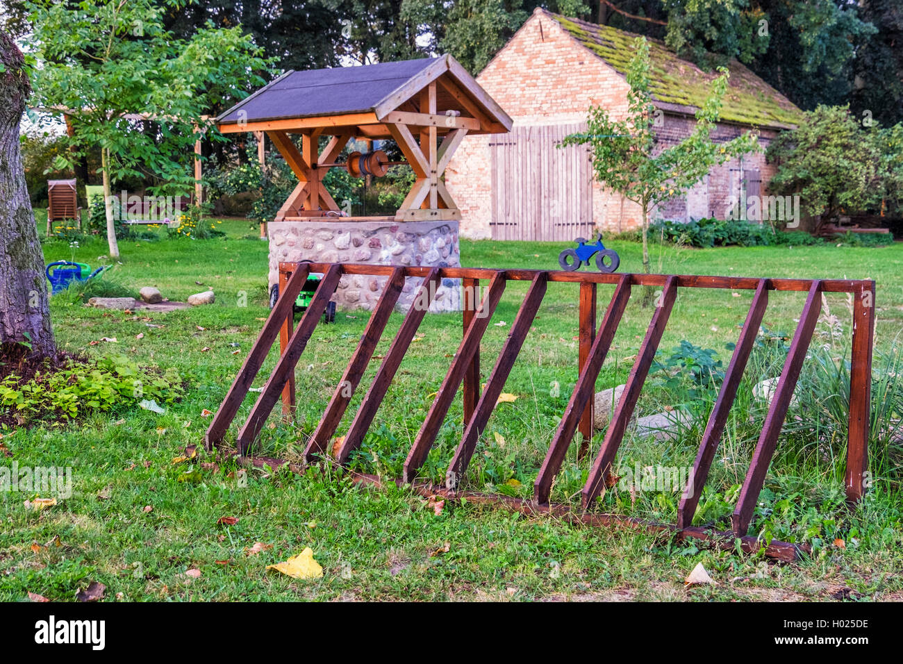 Wooden bicycle stand water well hires stock photography and images Alamy