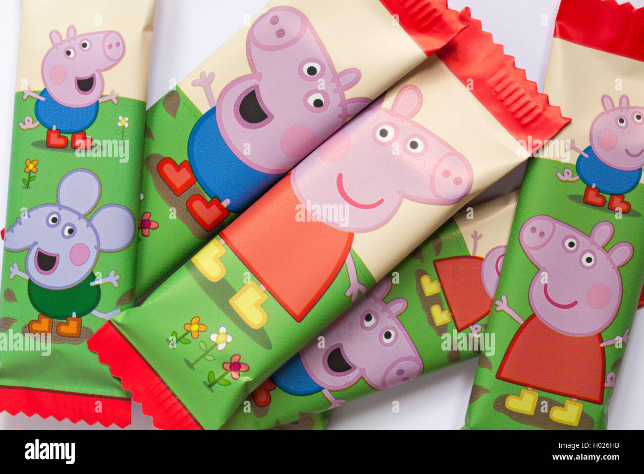 Peppa Pig muddy puddle bars from Kinnerton - white chocolate bars with a muddy puddle splat made in Great Britain Stock Photo