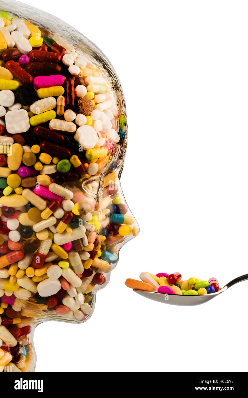 head filled with pills Stock Photo