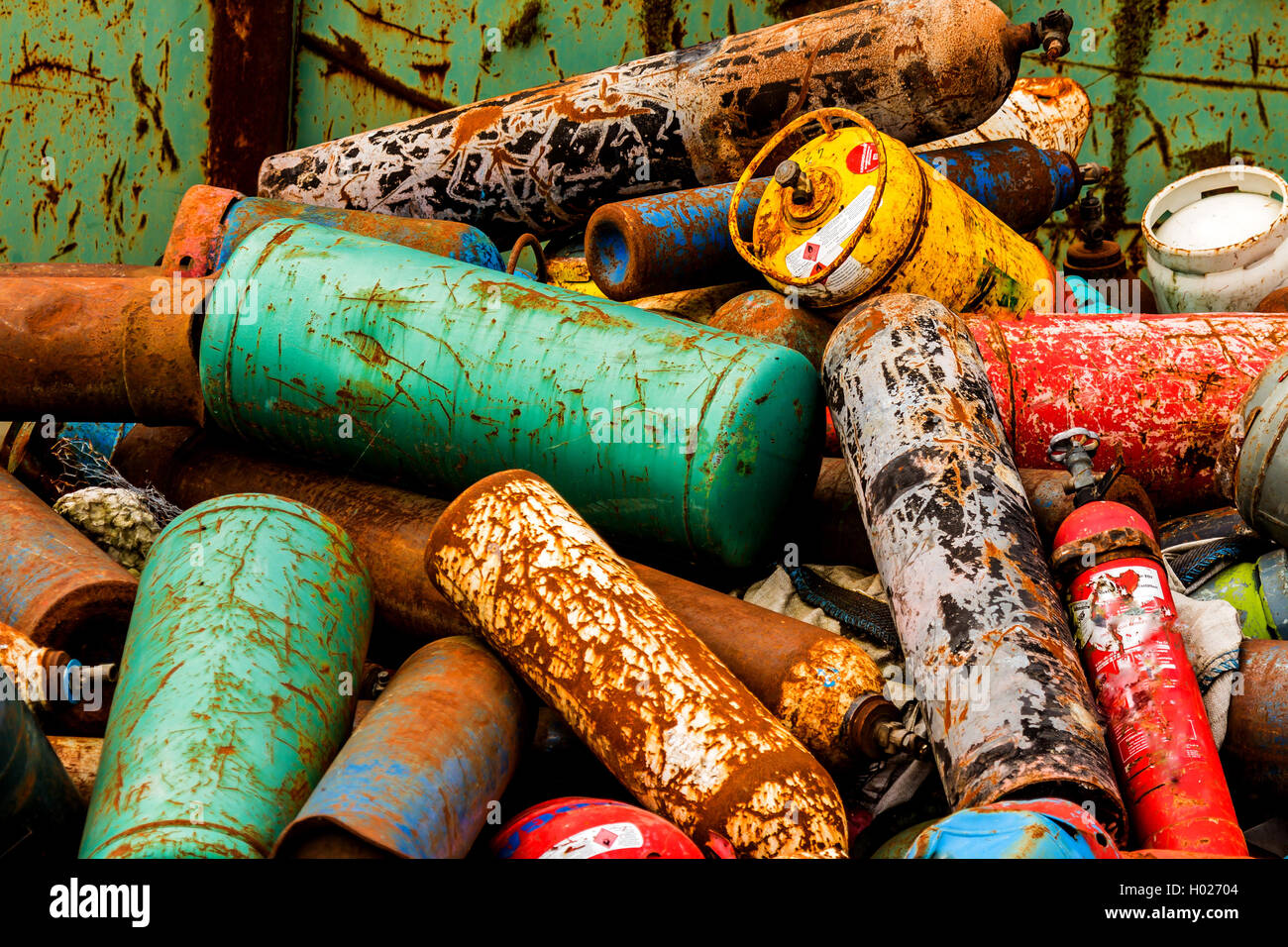 old gas bottles on a scrapyard, Austria Stock Photo Alamy