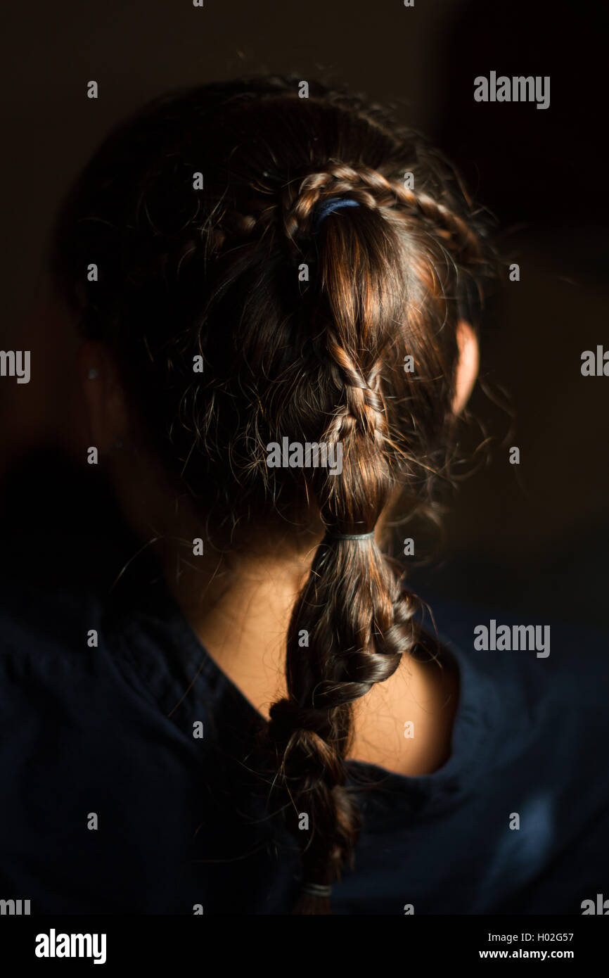Young woman's braid. Stock Photo