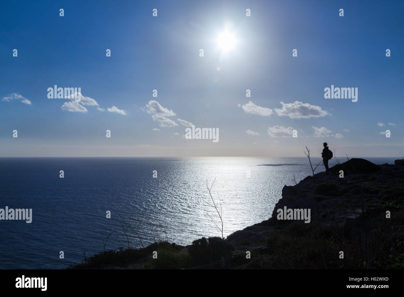 Girl watching sunset hi-res stock photography and images - Alamy