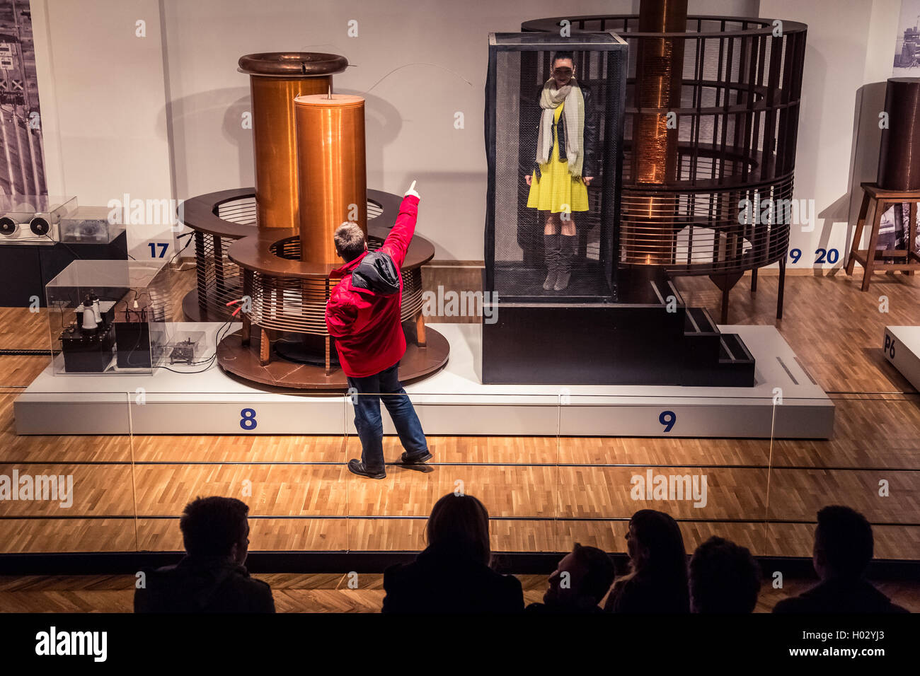 ZAGREB, CROATIA - 17 MARCH 2015: Museum staff showing an exibition to visitors in the Tesla part of the museum in Tehnicki muzej Stock Photo