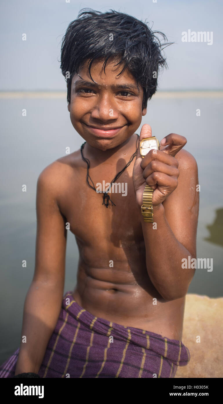 Varanasi India 25 February 2015 Indian Boy Sits Shirtless On Rock