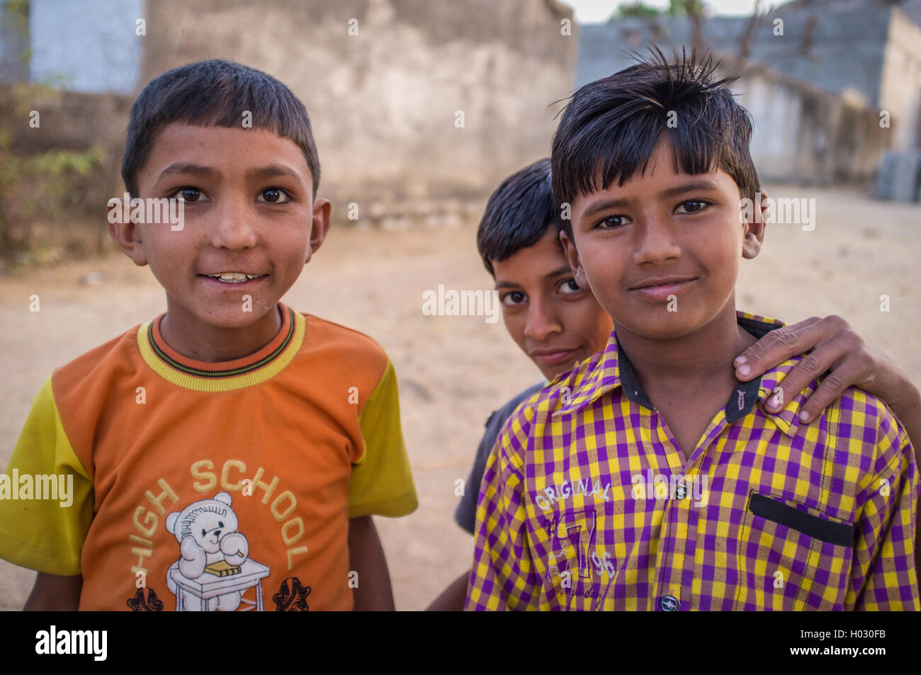 GODWAR REGION, INDIA - 12 FEBRUARY 2015: Three boys from Rabari tribe. Loss of tradition gains pace from every new generation. R Stock Photo