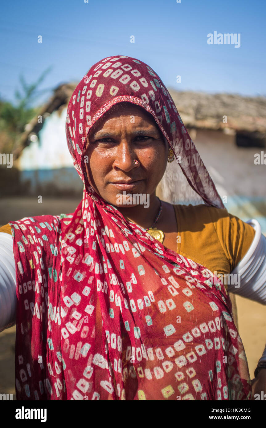 GODWAR REGION, INDIA - 13 FEBRUARY 2015: Rabari tribeswoman in sari decorated with traditional upper-arm bracelets. Rabari or Re Stock Photo